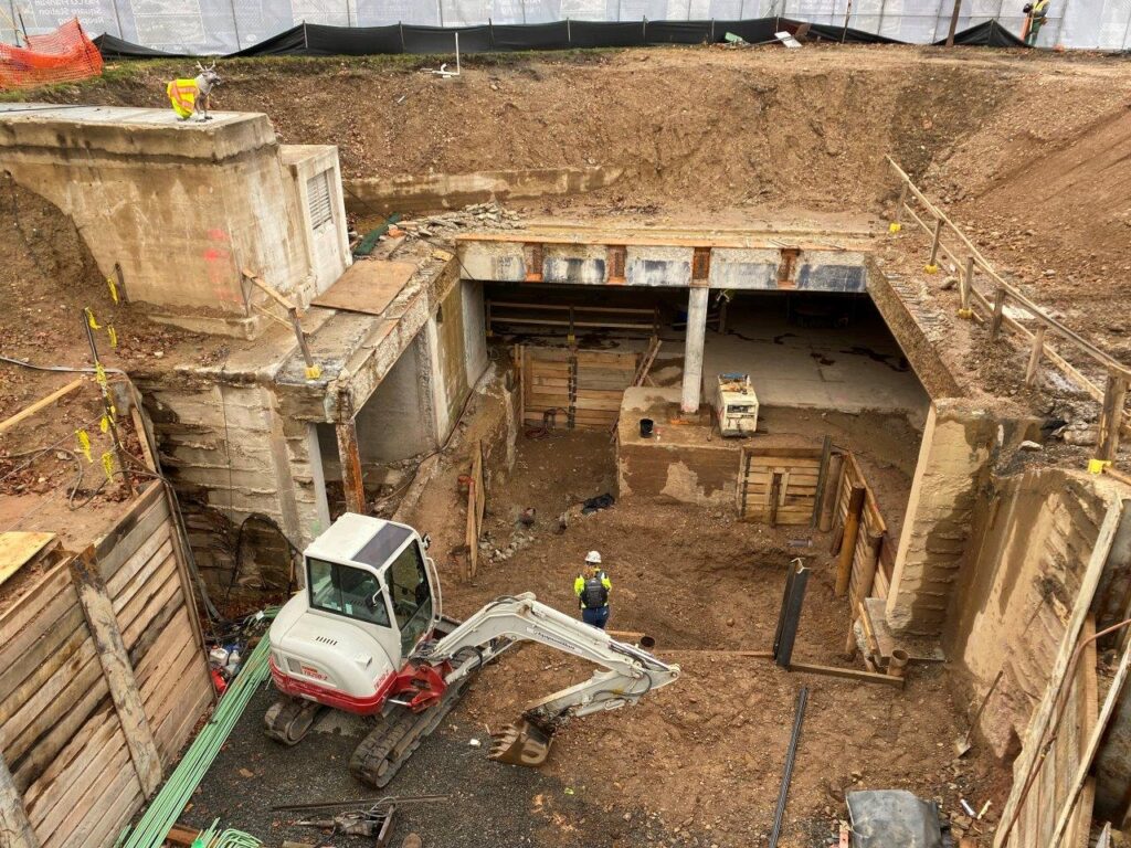 Excavation work and the installation of a pipe pile support of excavation wall at the elevator and escalator foundations is now complete.