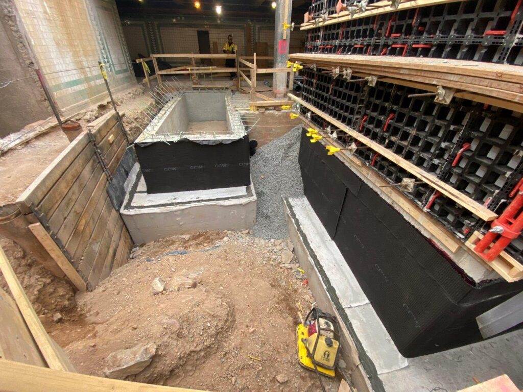 Waterproofing has been applied to the exterior faces of the Elevator and Escalator foundations and pit walls.