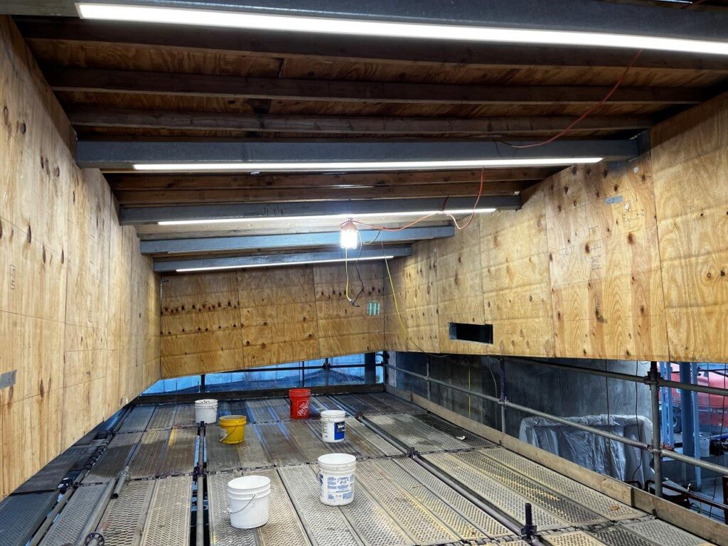 Plywood sheathing installation is now complete around the roof skylight.