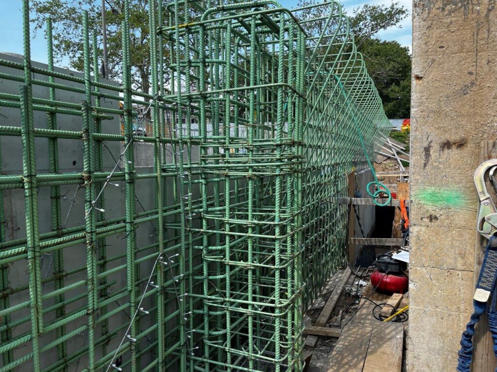 Main Entrance north staircase upper wall and north column reinforcing steel have now been installed.