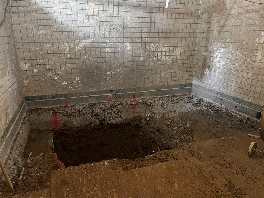 Existing soil has been excavated to accommodate the new station ejector pit.