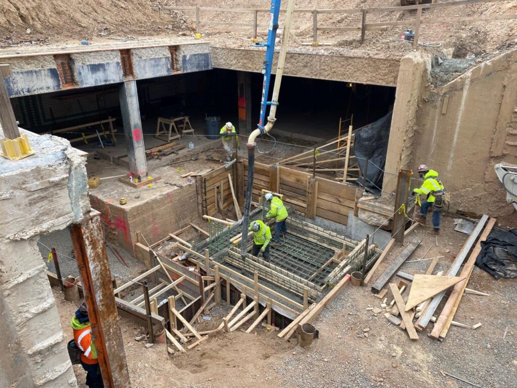 Elevator foundation and pit reinforcing steel and concrete have been placed. Elevator shaft wall formwork and reinforcing steel continue to be installed.