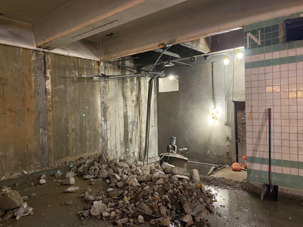 Interior wall demolition work is underway in preparation for the installation of micropile foundation elements.