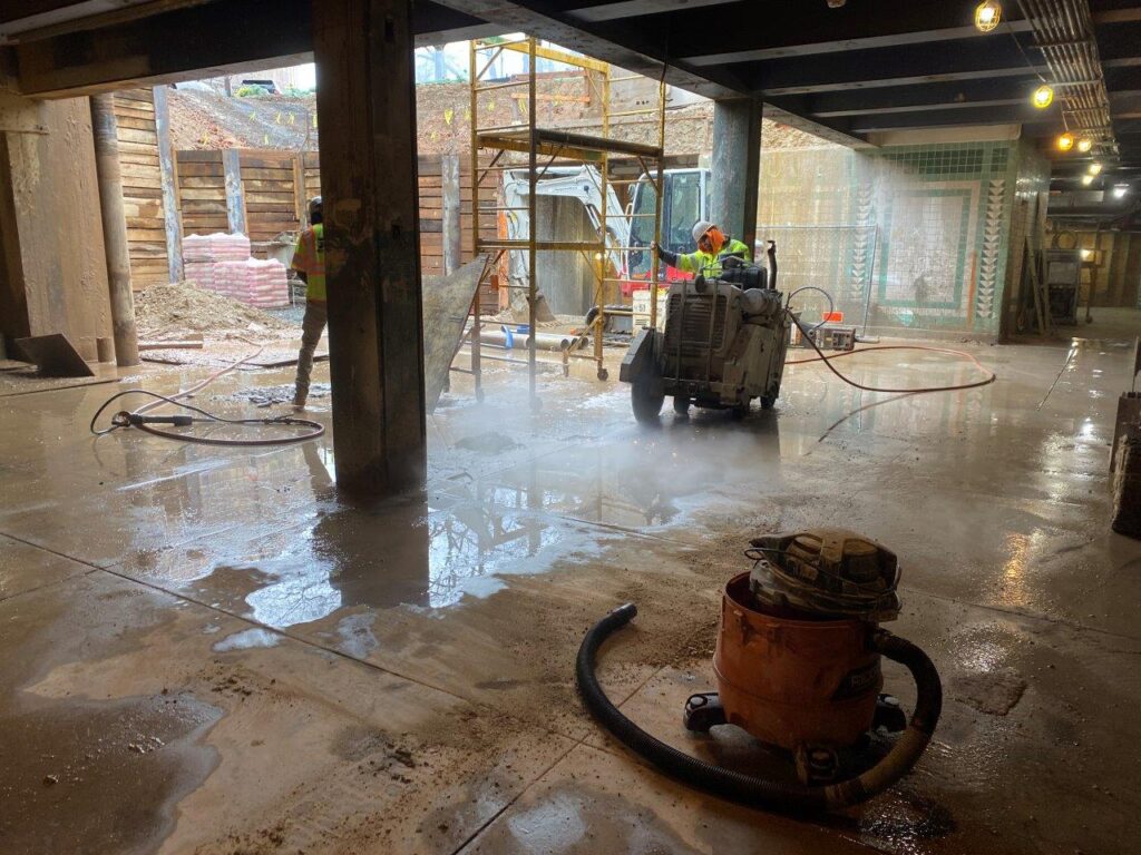 Saw cutting of the existing Station Concourse floor slab has been completed, in preparation for the demolition of the slab and installation of the elevator, escalator, and staircase.